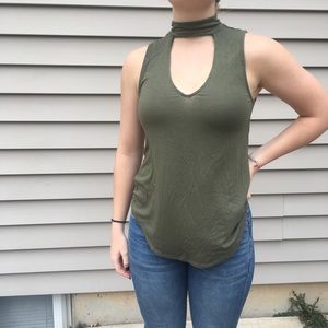 Green tank with open chest